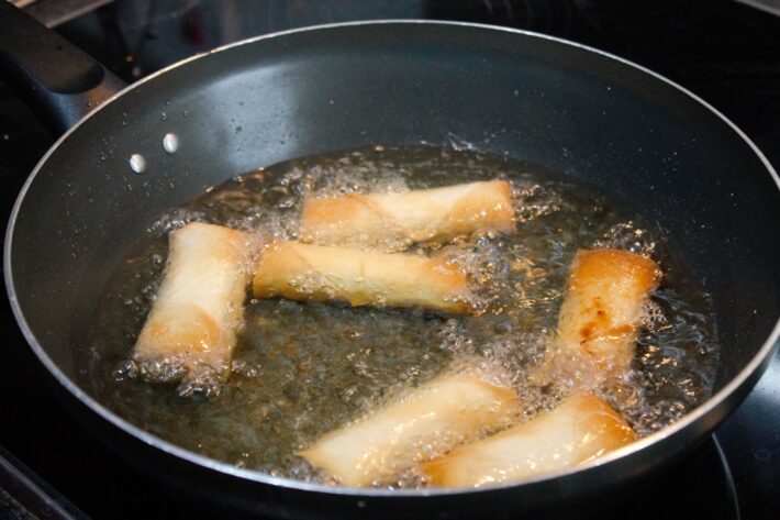 Spring rolls frying